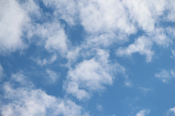 Beautiful Altocumulus clouds on the blue sky during spring sunny day. Theme of beautiful landscapes.