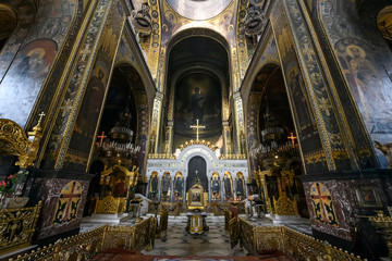 Interior of the St. Volodymyr's Cathedral with altar and fragments of frescoes wall paintings. Kyiv, Ukraine. April 2020