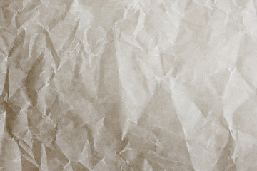 Crumpled white paper textured background