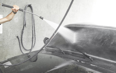 Car washing. The washing process on a self service car wash