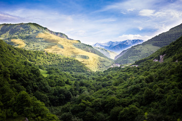 Obraz premium Mountains rocks a relief a landscape a hill a panorama Caucasus top a slope clouds the sky a landscape