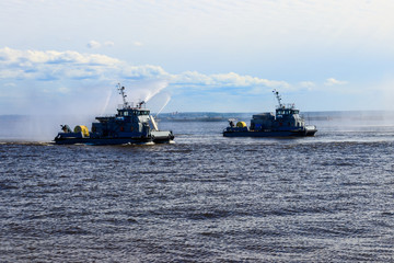 Extinguishing a burning ship during naval exercises