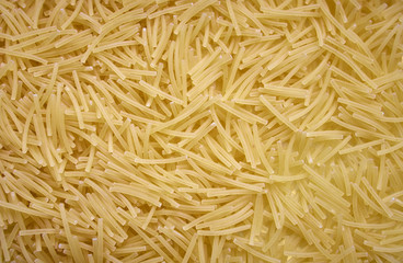 Close up photo of raw durum wheat pasta, filini vermicelles
