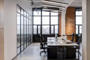 modern loft office interior with furniture