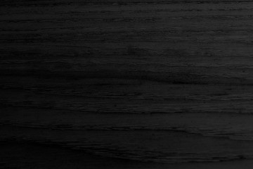 Naklejka premium Black wooden plank background