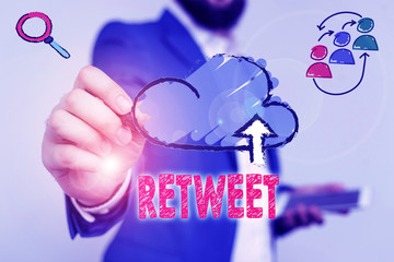 Writing note showing Retweet. Business concept for in twitter repost or forward a message posted by...
