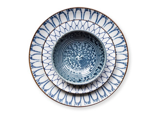 Set of beautiful round ceramic plate porcelain dish isolated on white background.