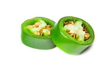 sliced jalapeno peppers isolated on white background. Green chili pepper. Capsicum annuum