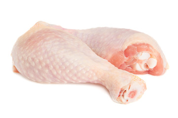 Raw chicken legs isolated on white background