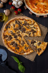 mixed thin crust pizza served