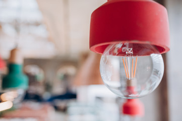 glass light bulb with red base