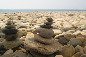 Stones on the seashore are gray in color