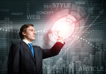 Handsome businessman using virtual interface