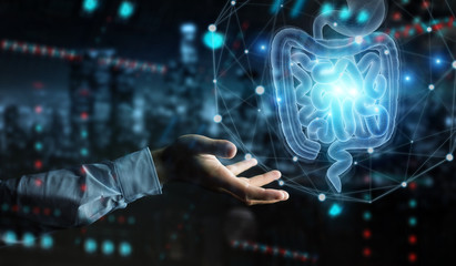Man hand using digital x-ray of human intestine holographic scan projection 3D rendering