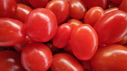 Background of cherry plum tomatoes in vintage style