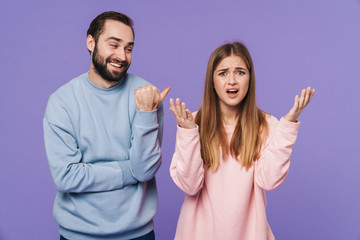 Man laughing of confused girlfriend