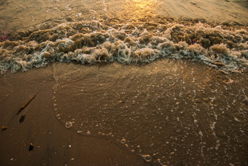 The beach by the sea at sunset in Thailand