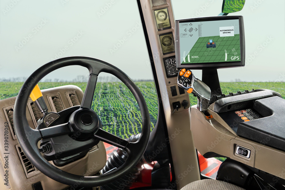 Poster autonomous tractor working on the field. smart farming