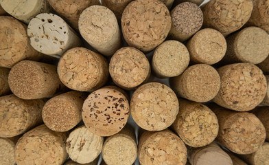 Many wine corks of different design, top down shot from above.