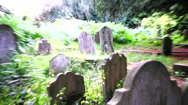 St Johns Hampstead Church Graveyard mossy tombstones foreground and background with Zoom
