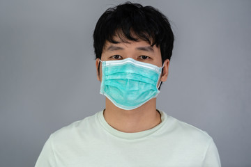 man wearing surgical mask (medical mask), virus protection.
