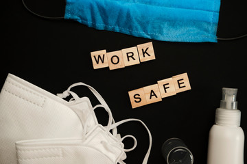 safety first concept with personal protection for workers on bright background