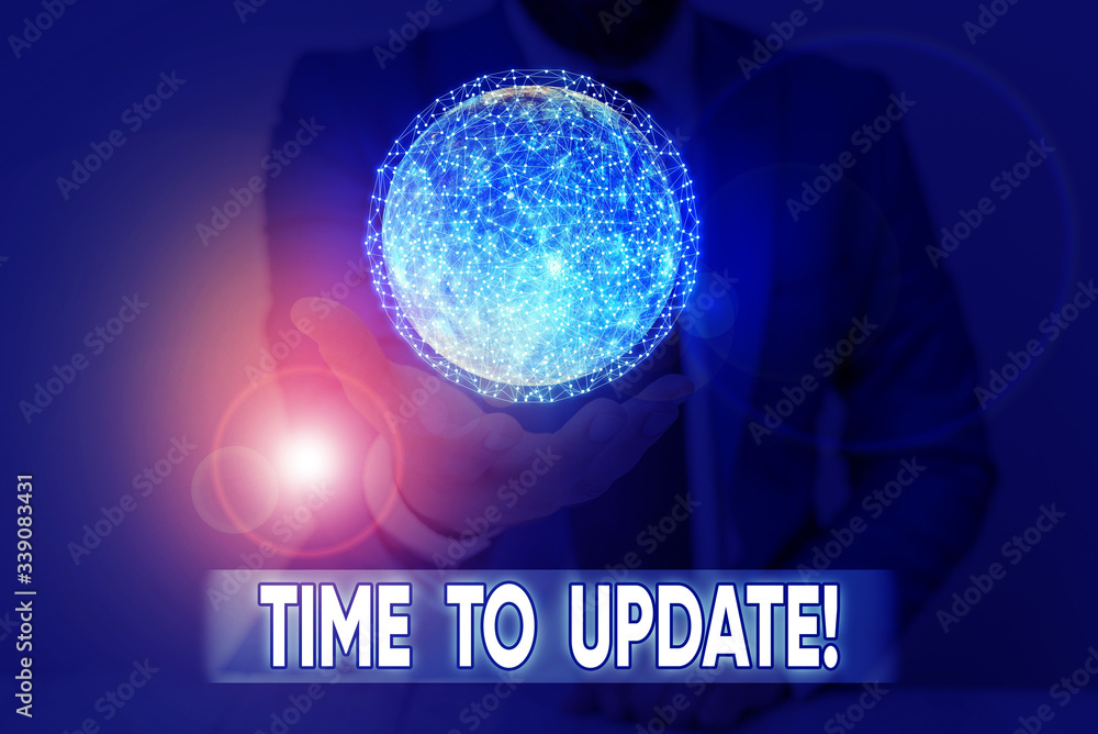 Wall mural writing note showing time to update. business concept for this is right moment to make something mor