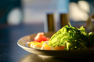 Tasty healthy breakfast with carpaccio meat, boiled eggs, corn, tomatoes and fresh salad. Healthy...
