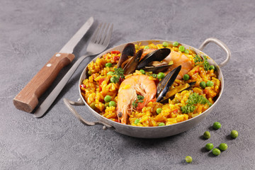 paella with rice and seafood- traditional spanish dish