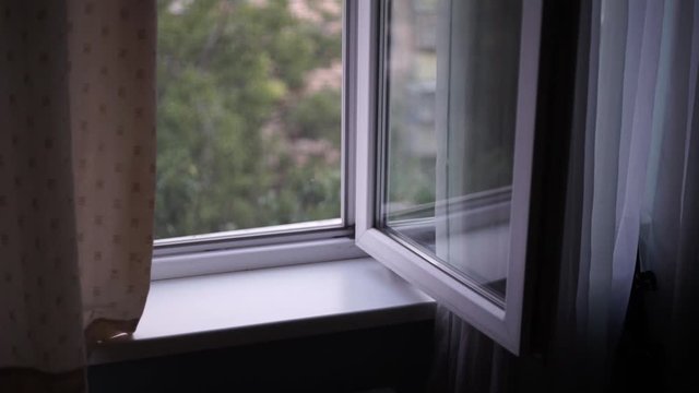 open window on a warm summer evening