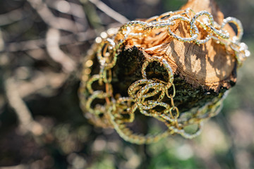 This season, multi-tiered chains of different types and sizes are fashionable. Faceted Golden links...