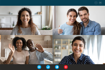 Laptop webcam screen view multiethnic families contacting distantly by videoconference. Living...