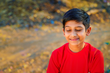 Portrait of beautiful winking little boy