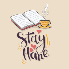 stay at home sign book mug of hot drink