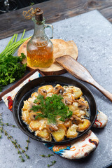 fried potatoes with mushrooms