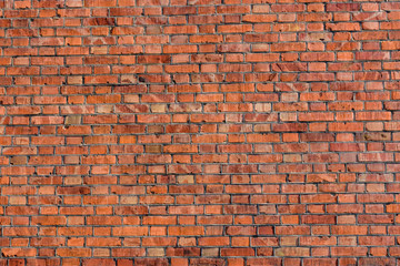 Fototapeta na wymiar Old wall of the red bricks for background