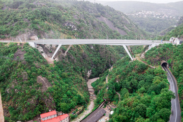 Obraz premium Bridge between the mountain Rijeka Croatia bridge view from the top of the mountain Trsat Fortress rainy day and evening time