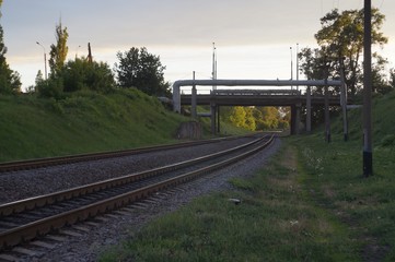 Fototapeta premium Old railway and railway bridge, rails and piles