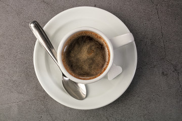 Coffee cup with spoon and sugar