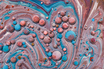 Colourful acrylic bubbles.Fluid art marble texture. Backdrop  abstract iridescent paint effect....