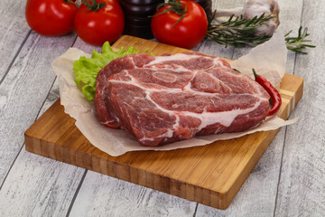 Raw pork neck steak