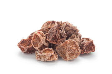 Pile of preserved plums isolated on white background. Chinese snacks.