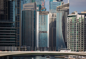 Fototapeta na wymiar DUBAI, UAE - NOVEMBER 13: Modern buildings in Dubai Marina, Dubai, UAE. In the city of artificial channel length of 3 kilometers along the Persian Gulf, taken on 13 November 2012 in Dubai.