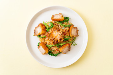 Stir-fried rice vermicelli and water mimosa with crispy pork belly