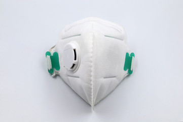 White medical mask isolated. Face mask protection against pollution, virus, flu and coronavirus on white background.