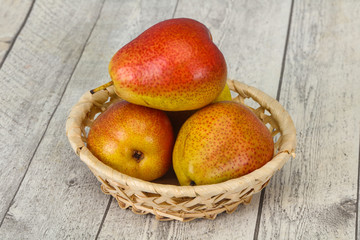 Pear heap in the wooden basket