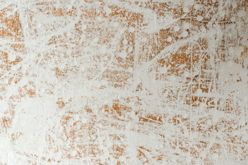 relief white-coffee background with a chaotic pattern of splashed white paint in daylight