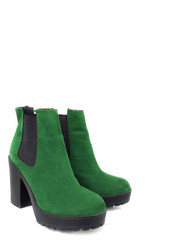Female green suede boots on white background, isolated product, top view. heeled shoes