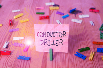 Conceptual hand writing showing Conductor Driller. Concept meaning means of conveying the upflowing...