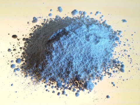 Close-up Of Zinc Oxide Powder On Table
